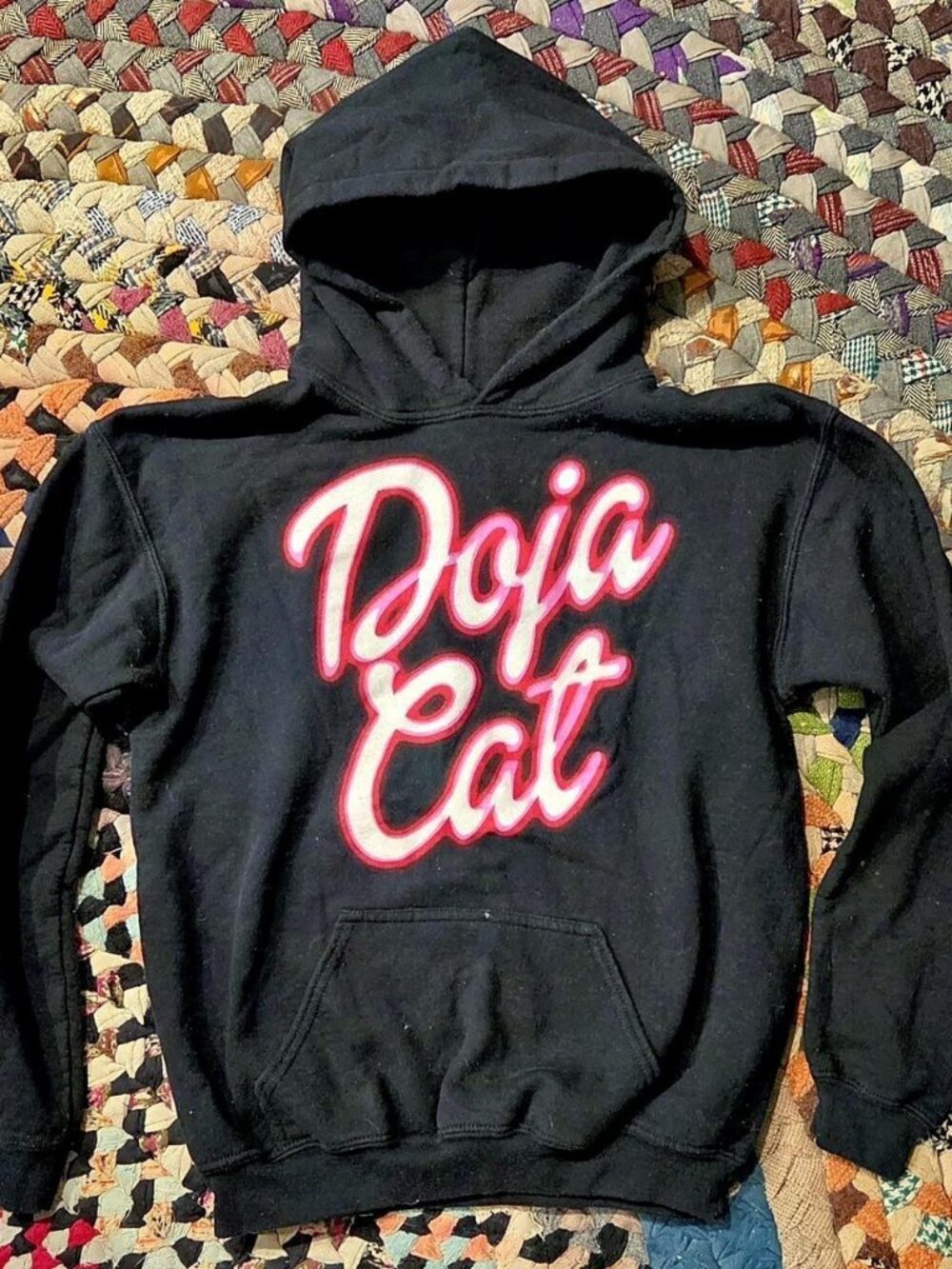 Girls Black Doja Cat hoodie with pink/white 'Doja Cat' text graphic, size S